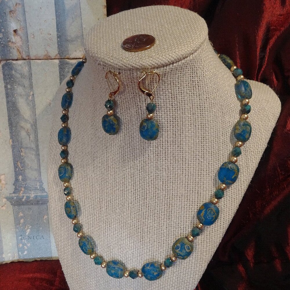 Hand-crafted artisanal necklace/earring set in moondust blue with Picasso finish